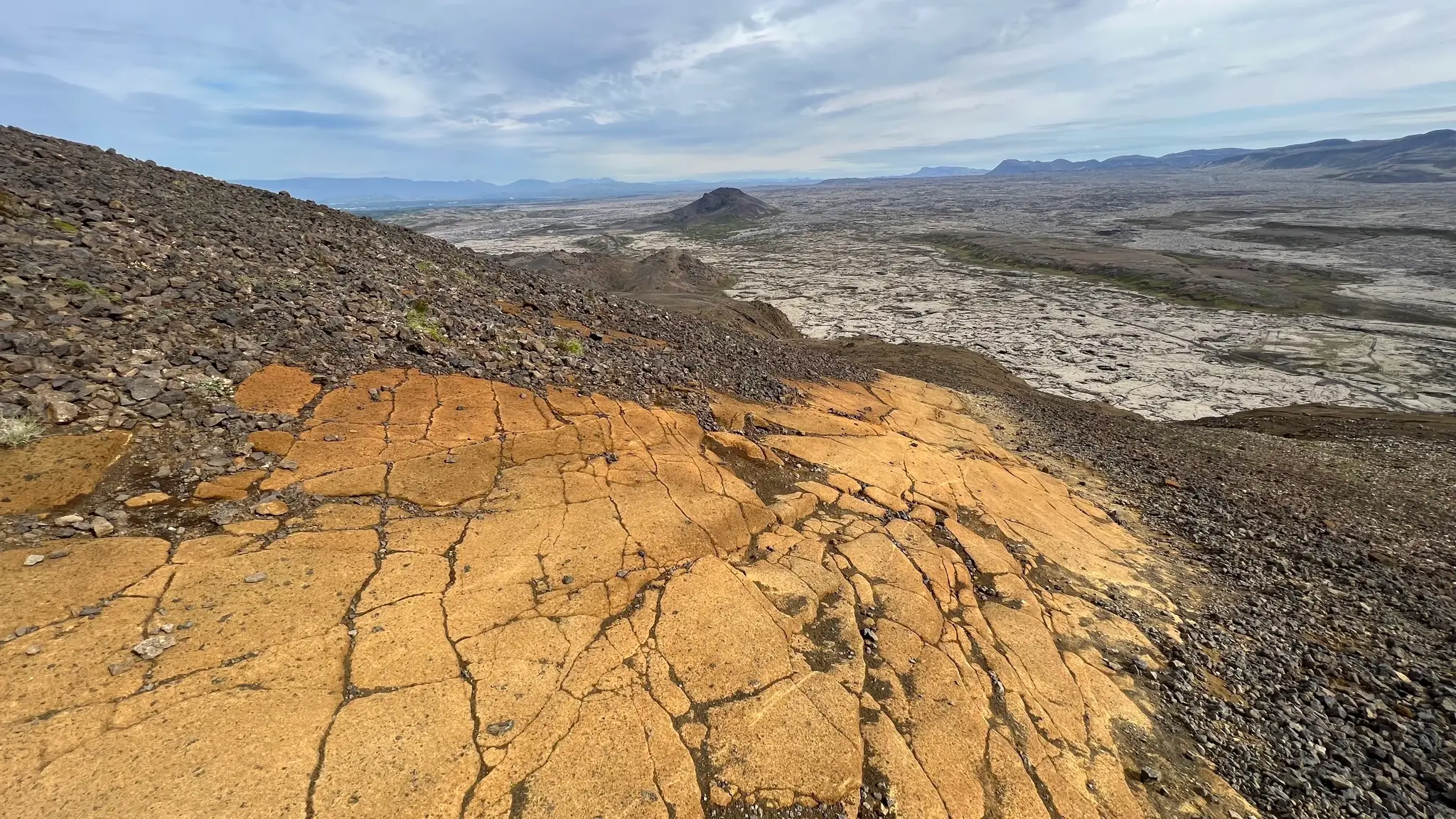 Smooth rock beneath the scree